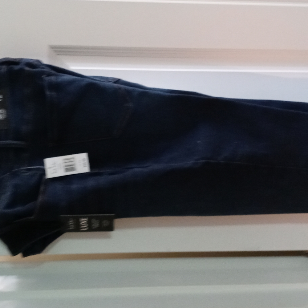 Ladies high rise  skinny leg jeans dark blue small 12 but little spandex
